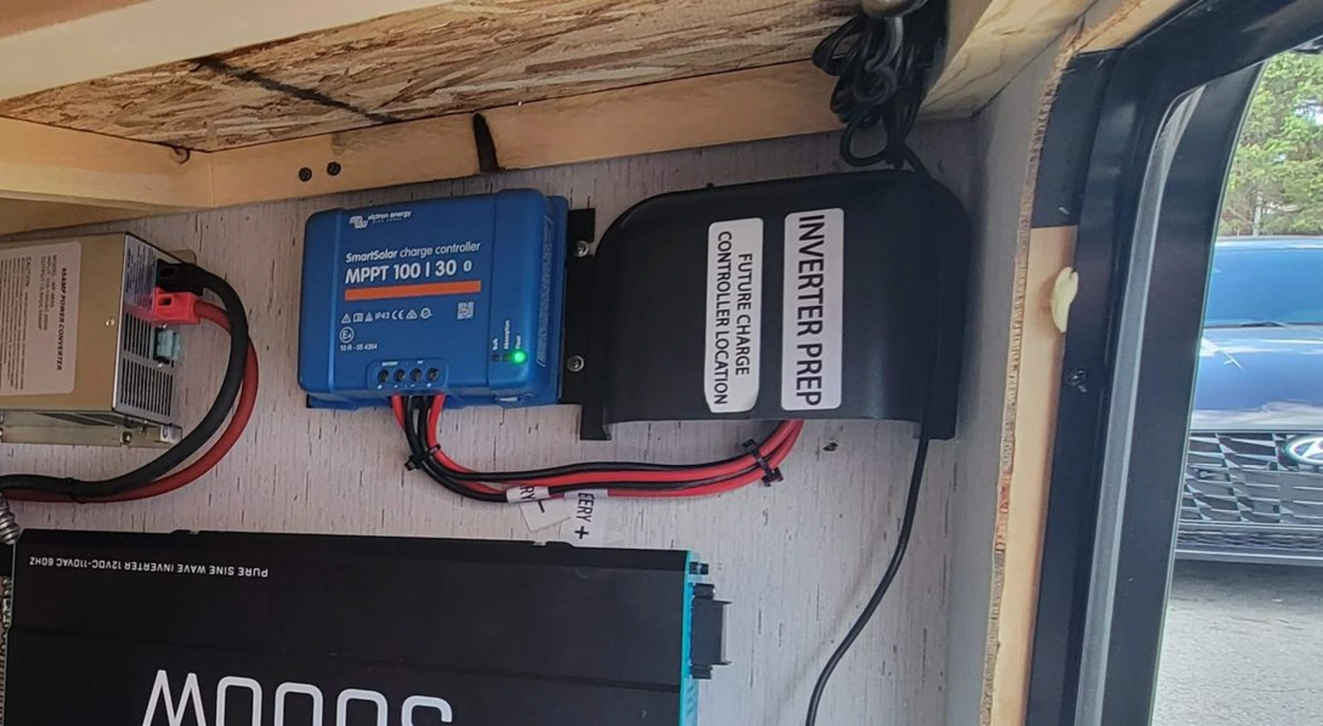 The Inverter prep cover inside of the pass-through compartment of an inverter-prepped bumper-pull travel trailer. The Inverter prep cover inside of the pass-through compartment of an inverter-prepped bumper-pull travel trailer.